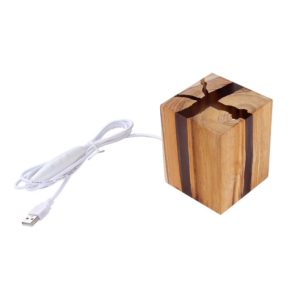 Houten oplaadbare tafellamp van Eriks-shop met warm licht, modern design en verstelbare stand.