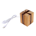 Houten oplaadbare tafellamp van Eriks-shop met warm licht, modern design en verstelbare stand.